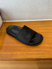 GG SLIDES IN BLACK SUEDE WITH EMBOSSED LOGO