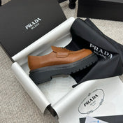 PRADA 25S LOAFER 50MM IN BURNT ORANGE CALFSKIN LOGO