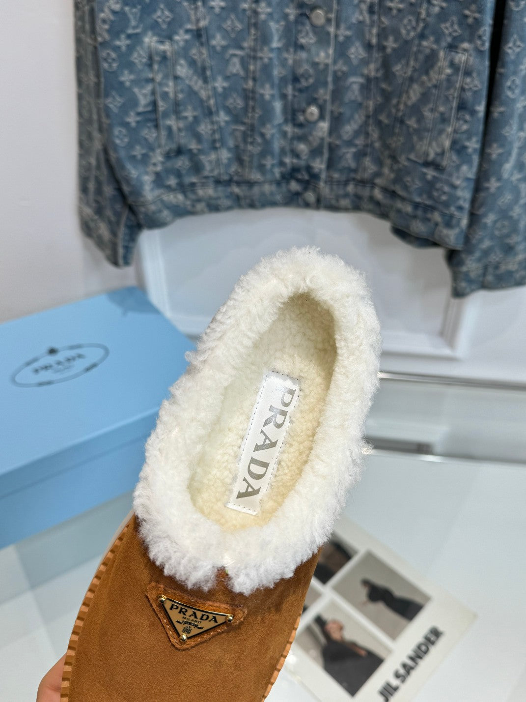 TRIANGLE LOGO MULES IN BRONZE BROWN SUEDE AND SHEARLING LINING