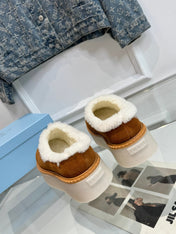 TRIANGLE LOGO MULES IN BRONZE BROWN SUEDE AND SHEARLING LINING