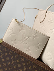 NEVERFULL 32 LIGHT BEIGE MONOGRAM EMPREINTE LEATHER