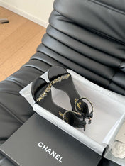 MID-HEEL 35 MM SANDAL IN BLACK SHEEPSKIN WITH STICKERS