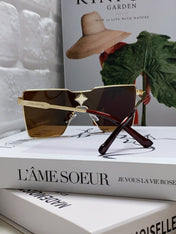 CYCLONE SUNGLASS 581374 IN GOLD METAL BRWON LENSES