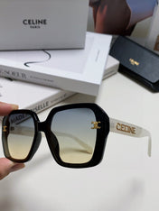 TRIOMPHE SUNGLASSES 548593 IN BLACK AND WHITE ACETATE