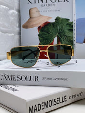 TRIOMPHE SUNGLASS 512997 IN GOLD METAL BLUE LENSES