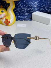 MONTAIGNE SUNGLASS 563194 IN GOLD METAL GREY LENSES