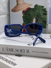 MONTAIGNE SUNGLASS 571595 IN BLUE ACETATE TEXT LOGO