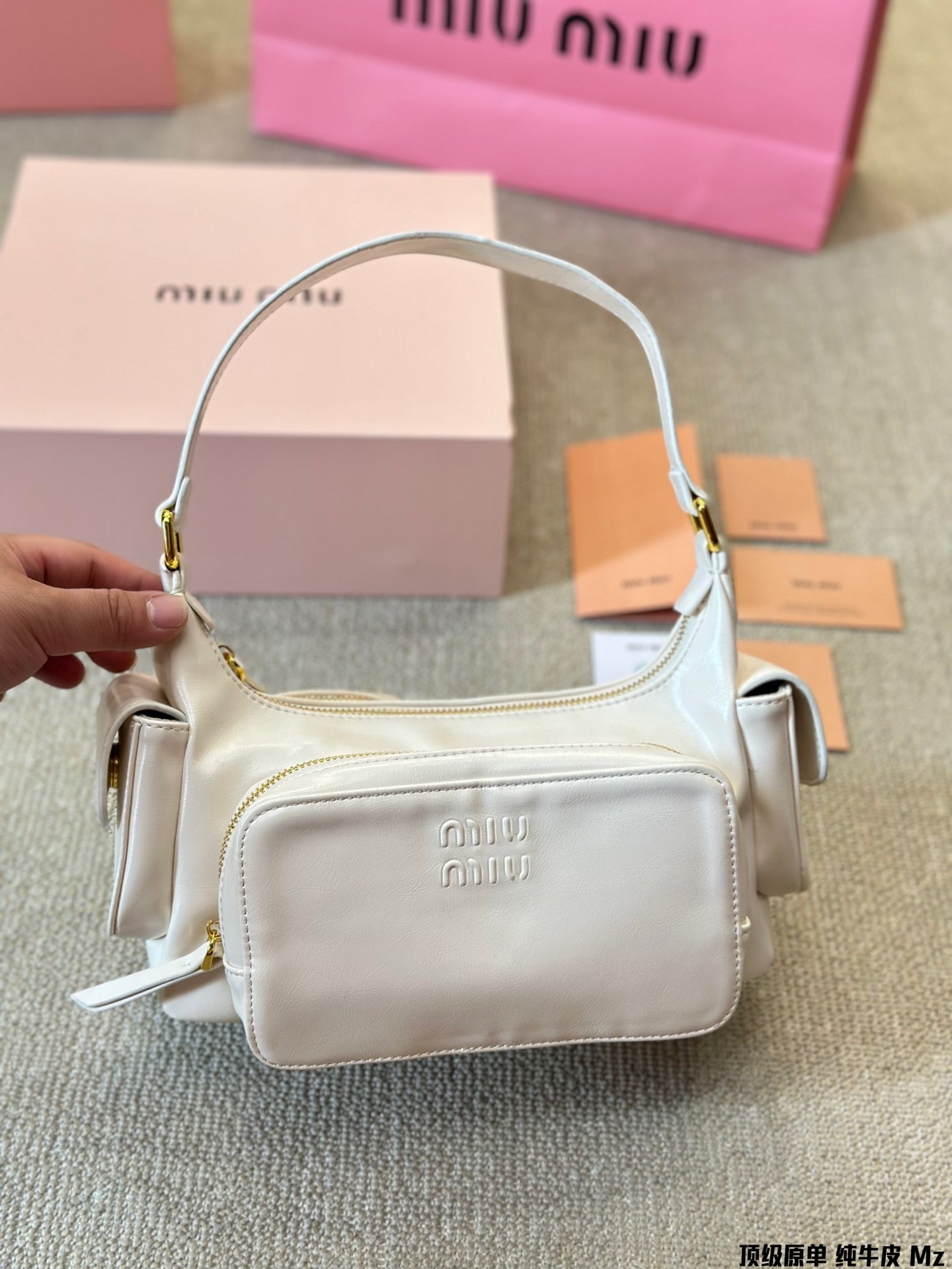 PUCKET BAG 27 IN WHITE CALFSKIN