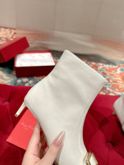 VIV CANARD ANKLE BOOTS IN WHITE GLOSSY CALFSKIN