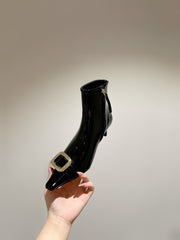 VIV CANARD ANKLE BOOTS IN BLACK PATENT CALFSKIN