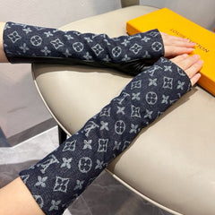 FINGERLESS LONG GLOVES IN BLACK MONOGRAM DENIM AND LAMBSKIN