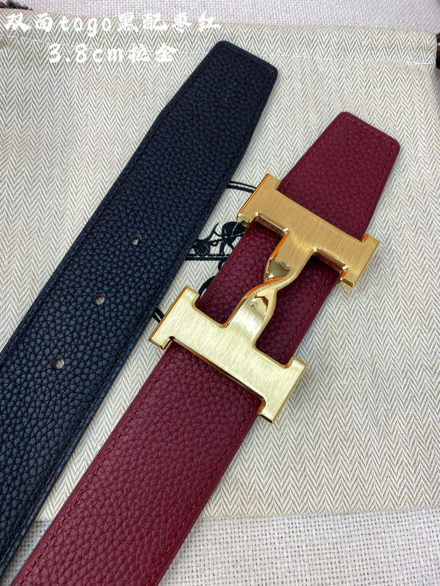 HM H BELT BUCKLE & REVERSIBLE WINE RED AND BLACK STRAP 38MM GOLD HARDWARE