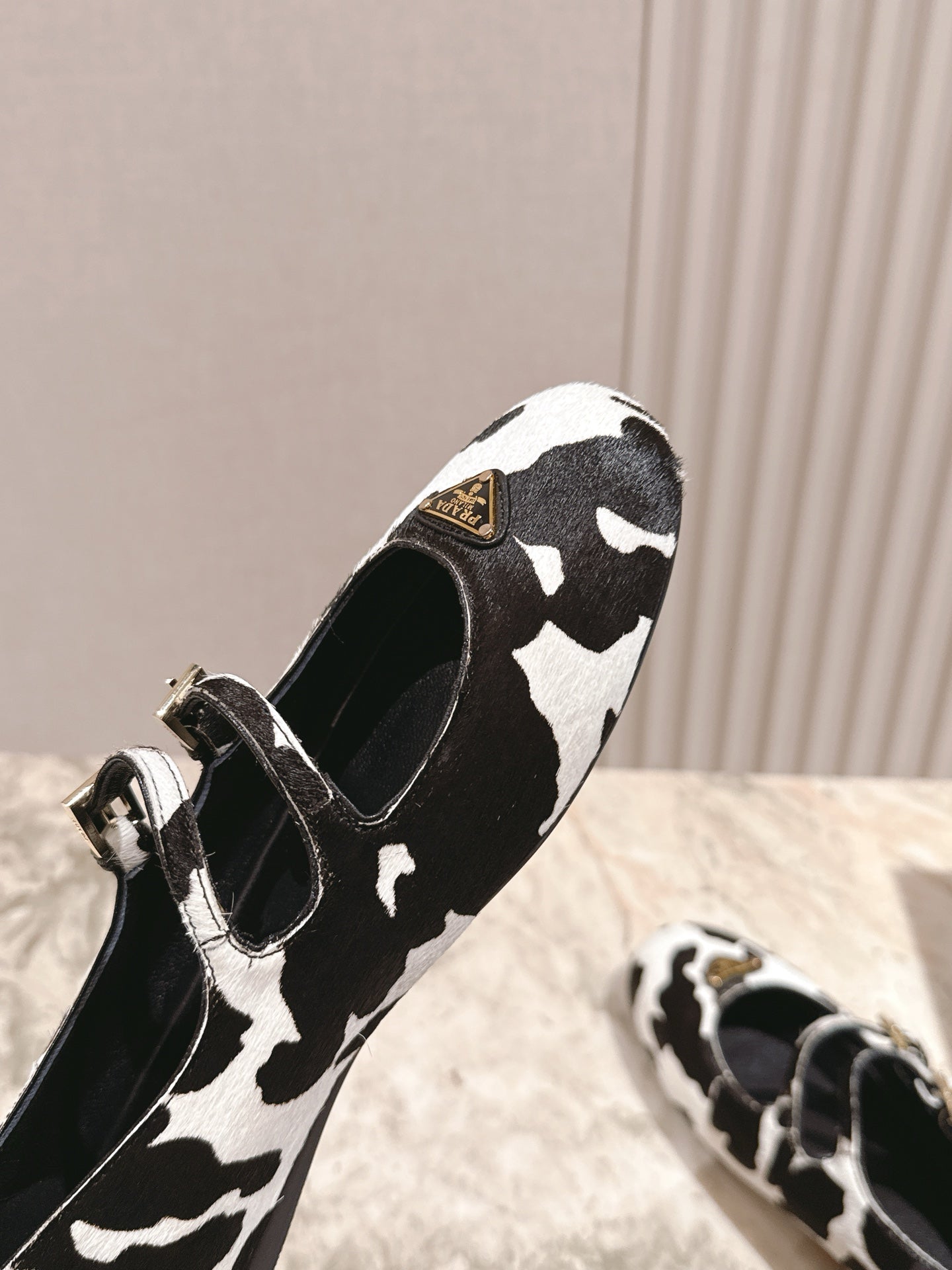 PRADA 25S CRYSTAL EMBELLISHED BALLERINA IN WHITE AND BLACK FUR