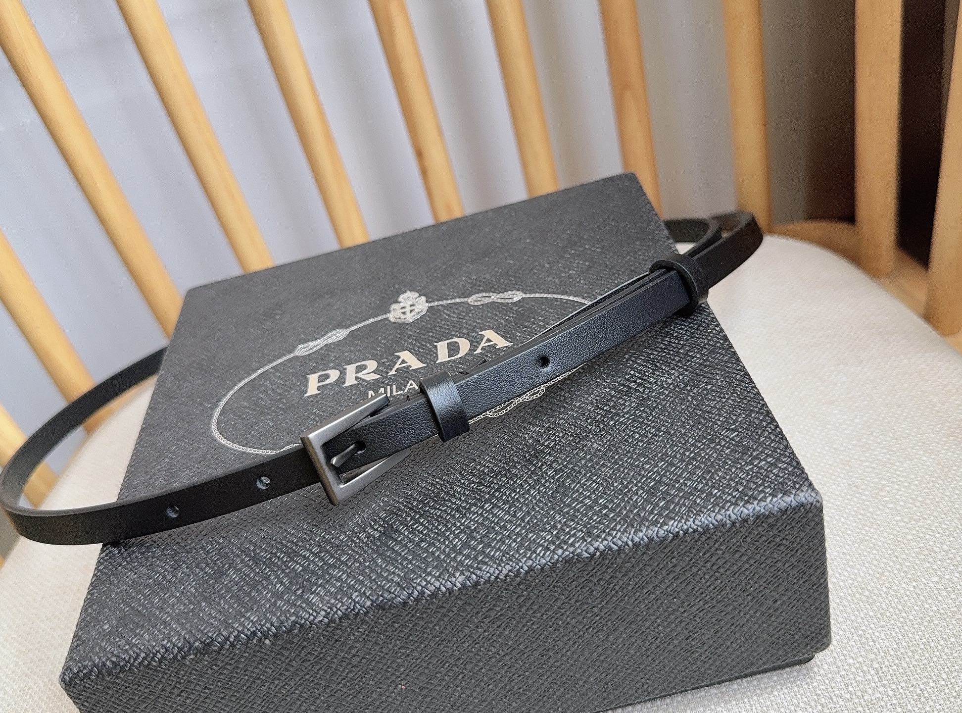 PRADA 25S BELT 10 MM IN BLACK CALFSKIN 598371