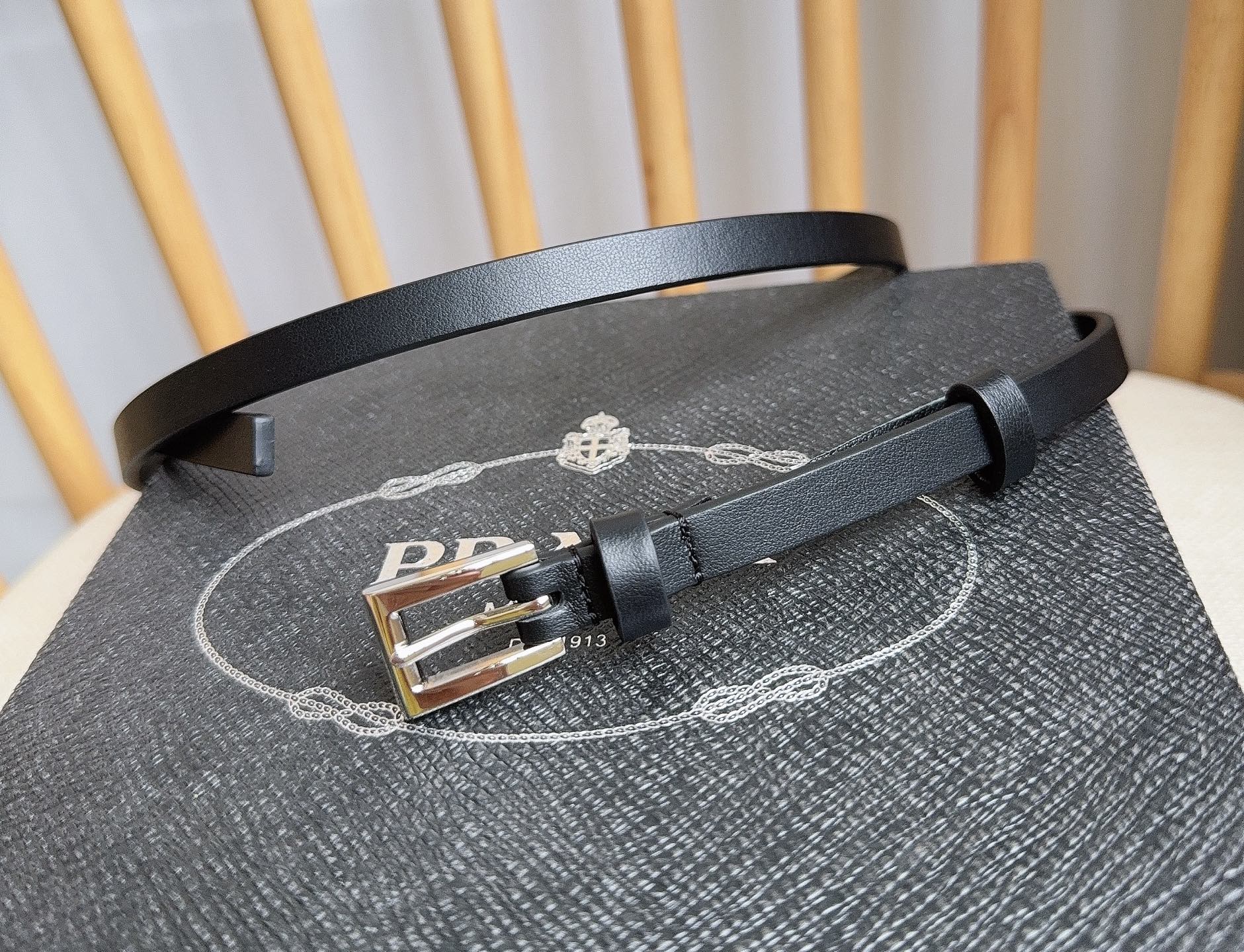 PRADA 25S BELT 10 MM IN BLACK CALFSKIN 598373