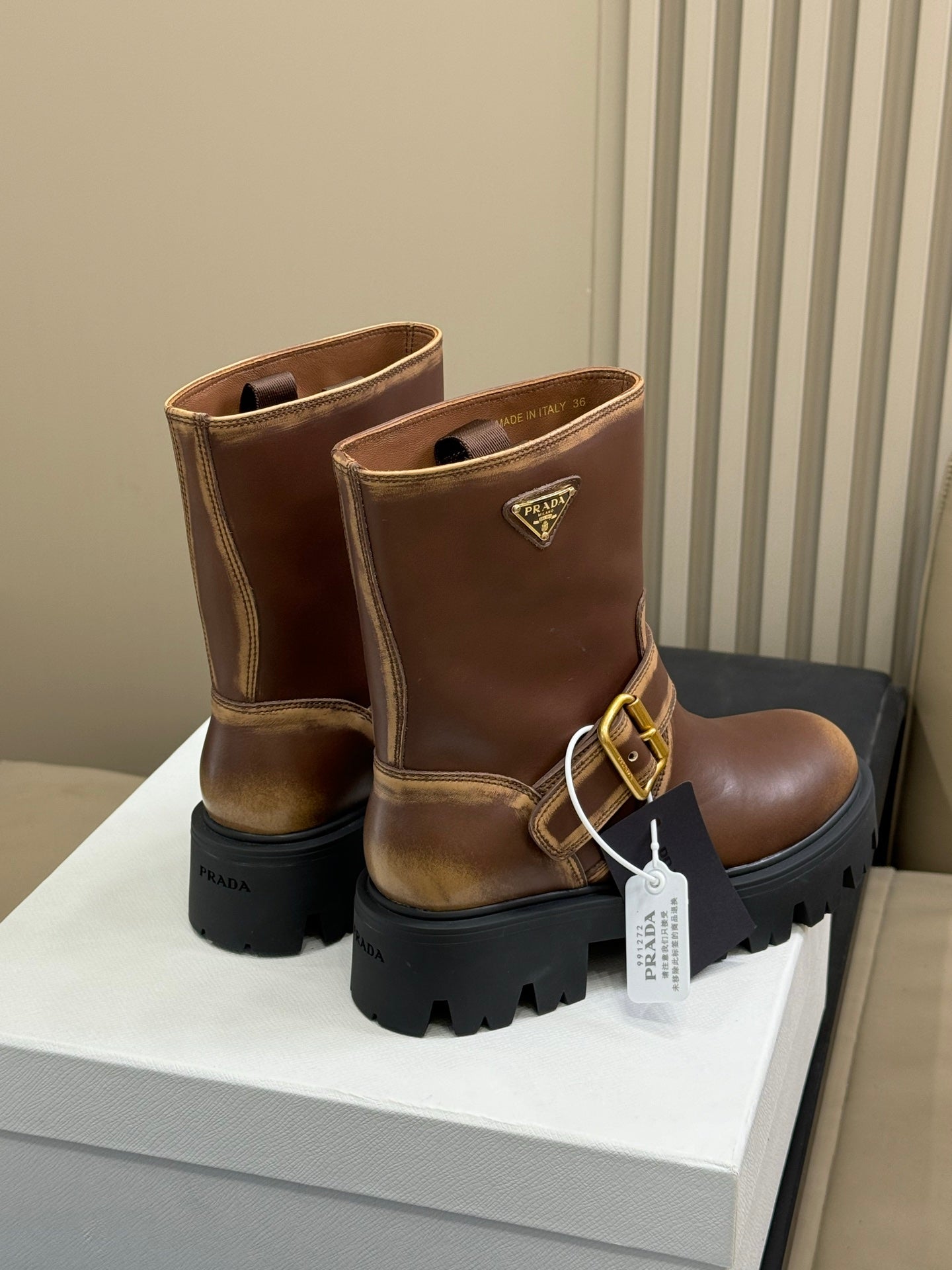 PRADA 25S PLATFORM ANKLE BOOTS IN DARK BROWN CALFSKIN WITH GOLD HARDWARE