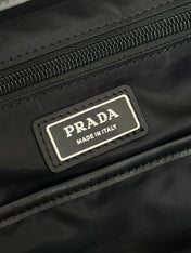 TRIANGLE LOGO BACKPACK 42 IN RHINO GRAY RE-NYLON