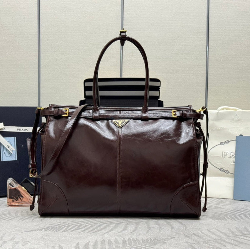 PRADA 25S BONNIE EXTRA-LARGE 42 IN DARK BROWN GLOSSY CALFSKIN GOLD HARDWRE