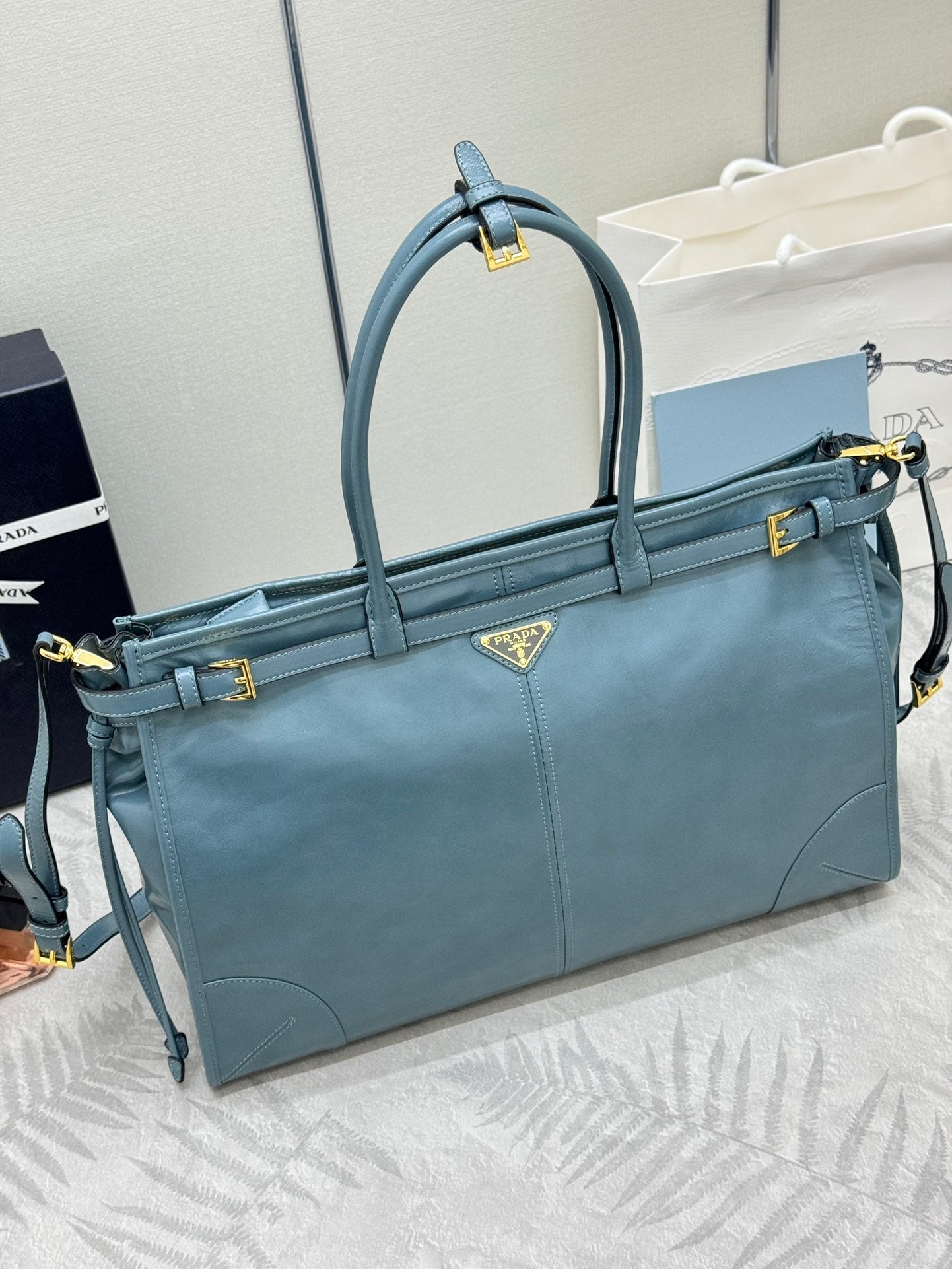 PRADA 25S LUX SOFT BAG 42 IN BLUE GLOSSY CALFSKIN GOLD HARDWRE