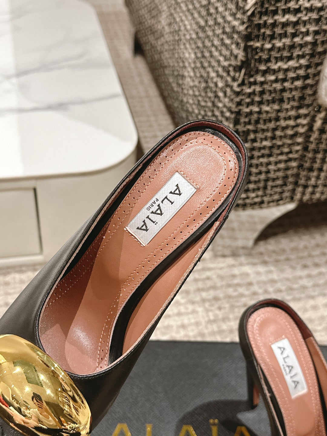 ALAIA SPIKE JEWEL MULES IN BLACK CALFSKIN WITH GOLD HARDWARE