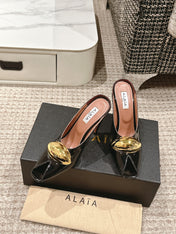 ALAIA SPIKE JEWEL MULES IN BLACK GLOSSY CALFSKIN WITH GOLD HARDWARE