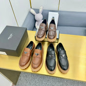 LOAFER WITH TRIANGLE LOGO IN COGNAC CALFSKIN