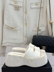 PLATFORM SLIPPERS IN WHITE LAMBSKIN