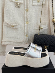 PLATFORM SLIPPERS IN SILVER LAMBSKIN