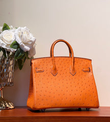 KELLY SELLIER 25 BAG IN FIRE ORANGE OSTRICH LEATHER WITH SILVER HARDWARE (MADE-TO-ODER)
