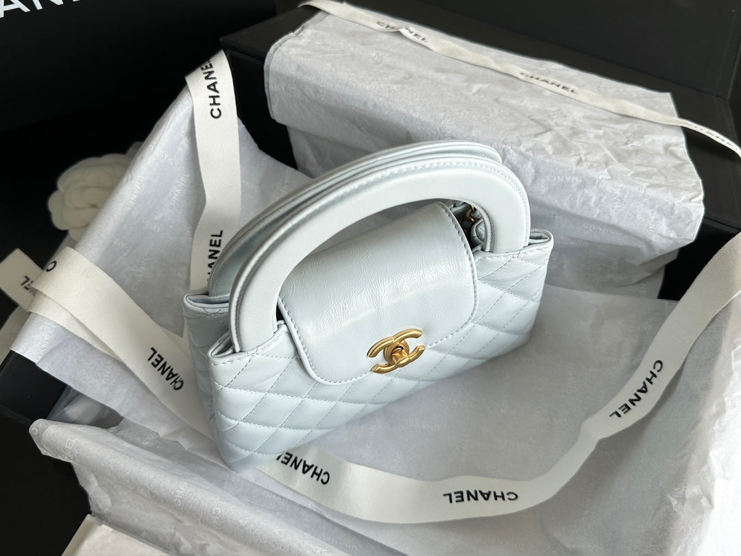 CHANEL VINTAGE KELLY 25S 19 CM IN PASTEL MINT GREEN LAMBSKIN WITH GOLD HARDWARE