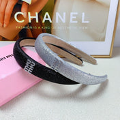 HEADBAND IN BLACK GLITTER FABRIC 174109