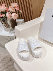 BLOCK SLIDE WITH TRIOMPHE IN WHITE SMOOTH LAMBSKIN