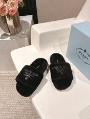 PRADA 25S FLAT MULES IN BLACK RABBIT FUR