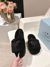 PRADA 25S FLAT MULES IN BLACK RABBIT FUR