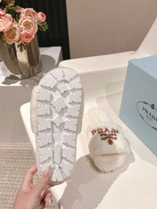 PRADA 25S FLAT MULES IN WHITE RABBIT FUR