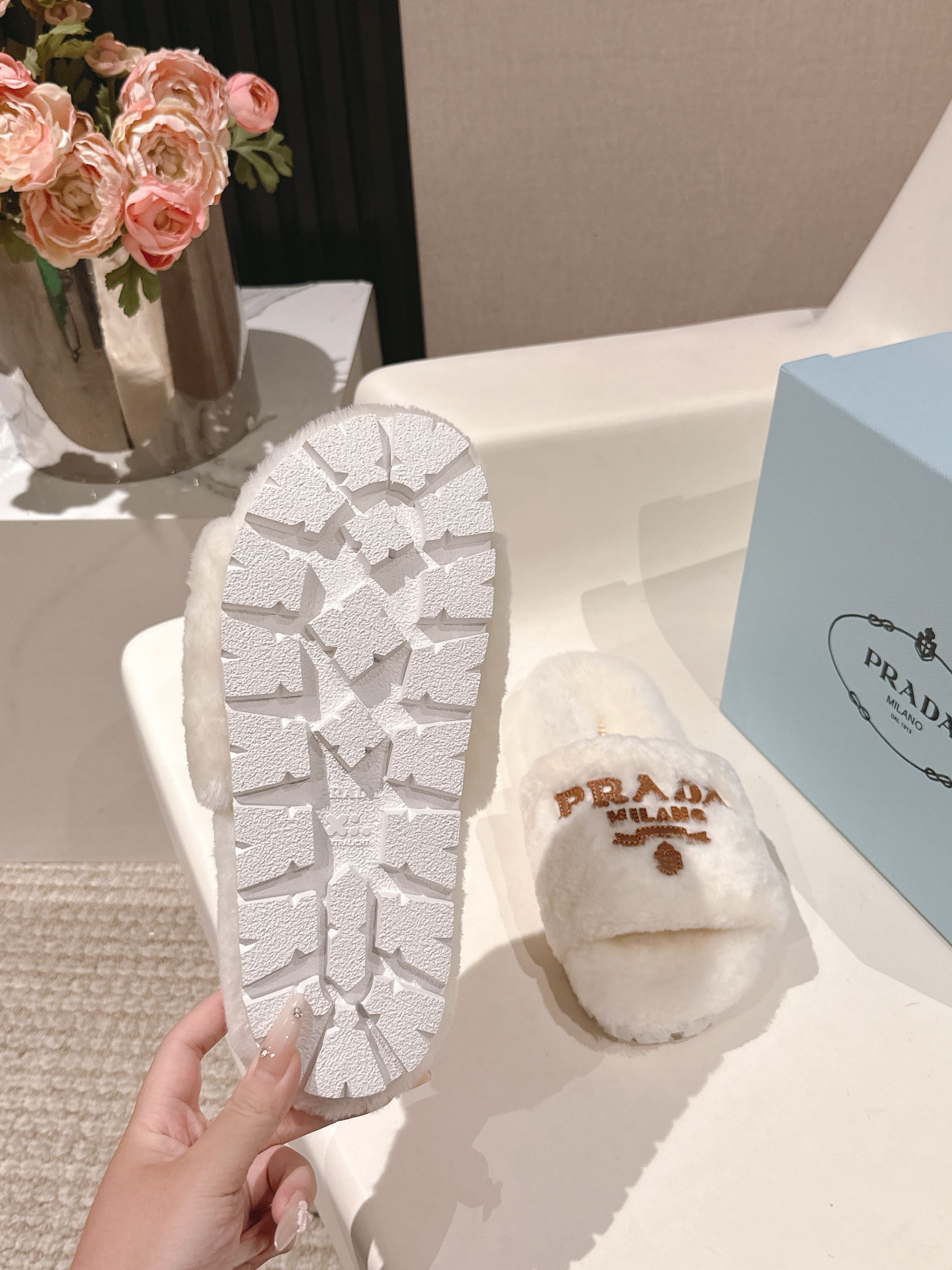 PRADA 25S FLAT MULES IN WHITE RABBIT FUR