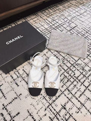 FLAT SLINGBACKS IN WHITE CALFSKIN AND BLACK FABRIC