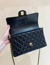 QUILTED FLAP BAG WITH HANDLE 26 IN BLACK LAMBSKIN GOLD PLATED METAL