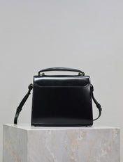 CASSANDRA MINI TOP HANDLE BAG 20 IN BLACK SMOOTH LAMBSKIN GOLD HARDWARE