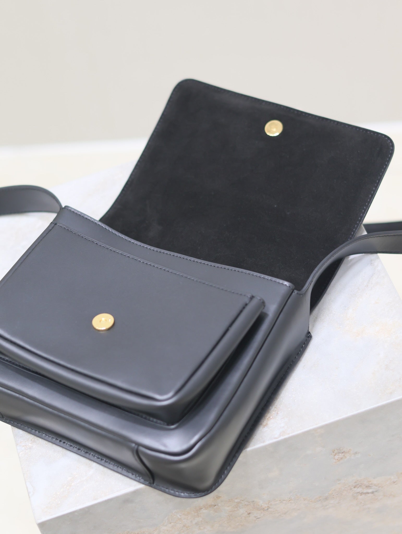 NIKI BABY 22 IN CHARCOAL GRAY CALFSKIN GOLD LOGO