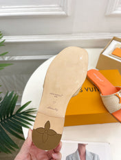 LV WOMEN CAPRI FLAT MULES IN TIGER ORANGE LEATHER AND RAFFIA