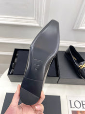 FLAT LOAFERS WITH GOLD CHAIN IN BLACK GLOSSY CALFSKIN