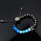 LV CHARM MONOGRAM BLACK AND BLUE BRACELET